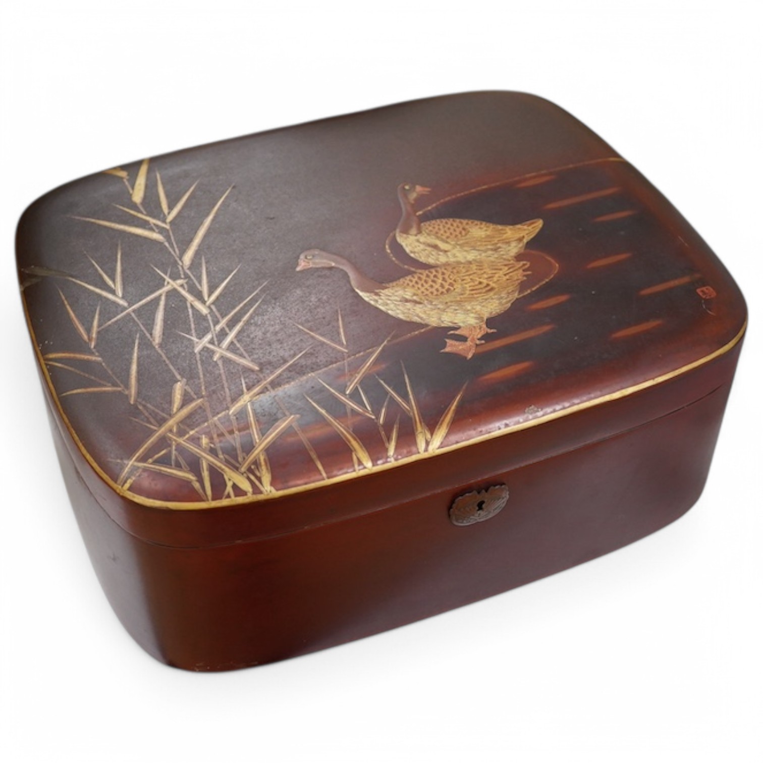 A Japanese red and gilt lacquer ‘geese’ box, 36cm wide. Condition - fair to good